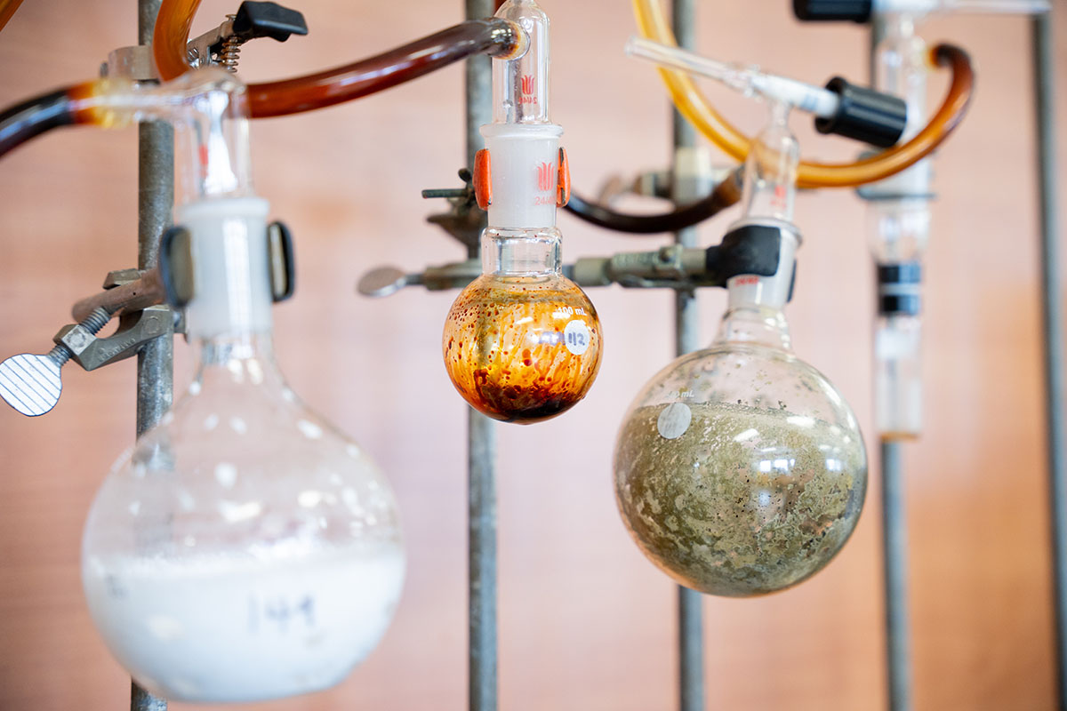 Various test tubes and glassware in a chemistry lab.