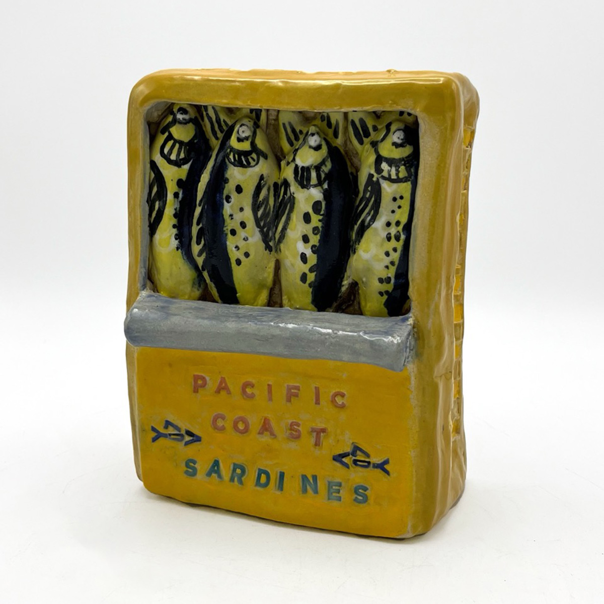 A can of sardines in clay.