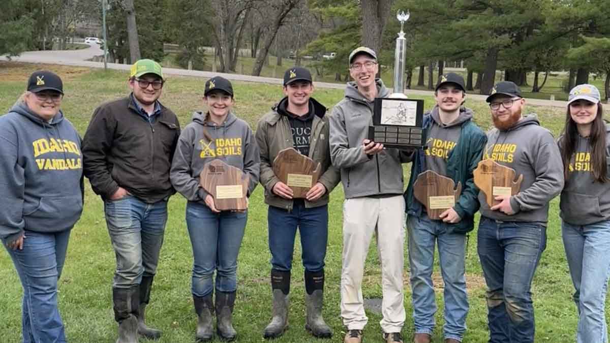 Students winning trophies from national collegiate soil judging contest.