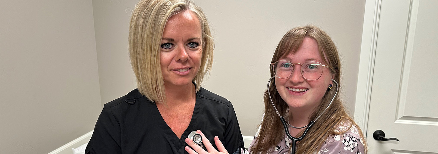 Idaho WWAMI medical student Sydney Mena uses a stethoscope.